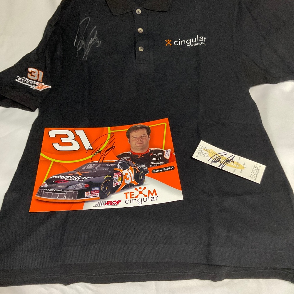 NASCAR’s Robby Gordon’s signed polo shirt, hero card and racing ticket.  M174